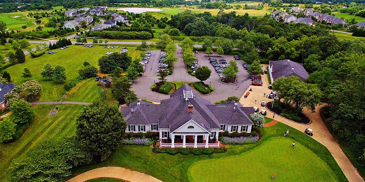 Photo of clubhouse at Raspberry Falls Van Metre golf course property.